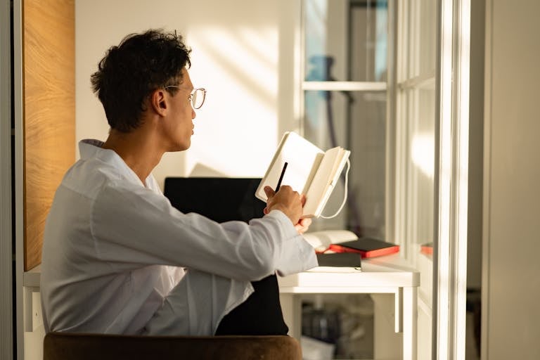 Man Starting His Health Journal